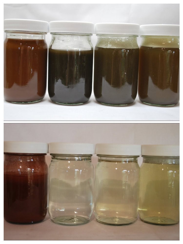 Samples of rust removal products in jars for iD Additives.